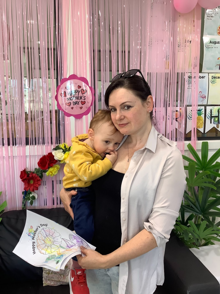 Jess Koroleva, the founder of JK beauty academy and wellness centre holds her baby